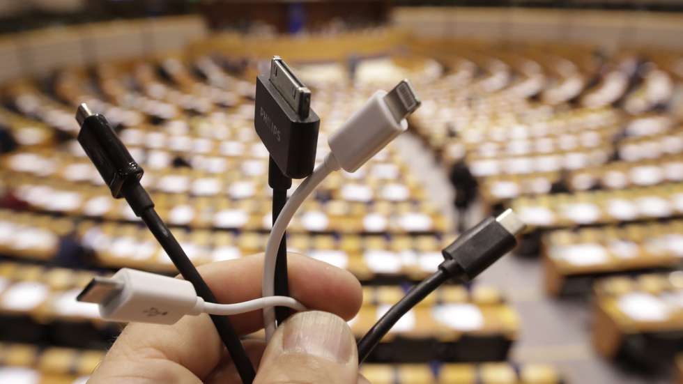 epa08178230 (ILLUSTRATION) Several plugs of common chargers for mobile and radio equipment are pictured prior to a plenary session of the European Parliament, in Brussels, Belgium, 30 January 2020. EU lawmakers have called on industry giants for a common charger to be developed in order to reduce electronic waste and make consumers' life easier.  EPA/OLIVIER HOSLET