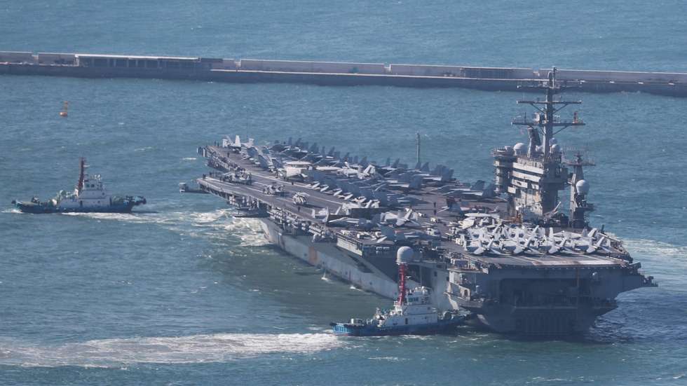 epa10554993 The US Navy's nuclear-powered aircraft carrier USS Nimitz sets sail from a naval base in Busan, South Korea, 02 April 2023.  EPA/YONHAP SOUTH KOREA OUT