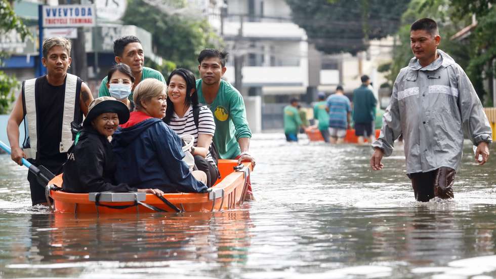 epa11682013 Residents ride on rafts in a flooded community in Cainta town, Rizal province, some 30 kilometers east of Manila, Philippines 25 October 2024. At least 30 people were killed and more than 200,000 villagers fled their homes as Tropical Storm Trami barreled the Philippines, officials said on October 25. Trami dumped heavy rain, triggering widespread flooding and landslides.  EPA/ROLEX DELA PENA