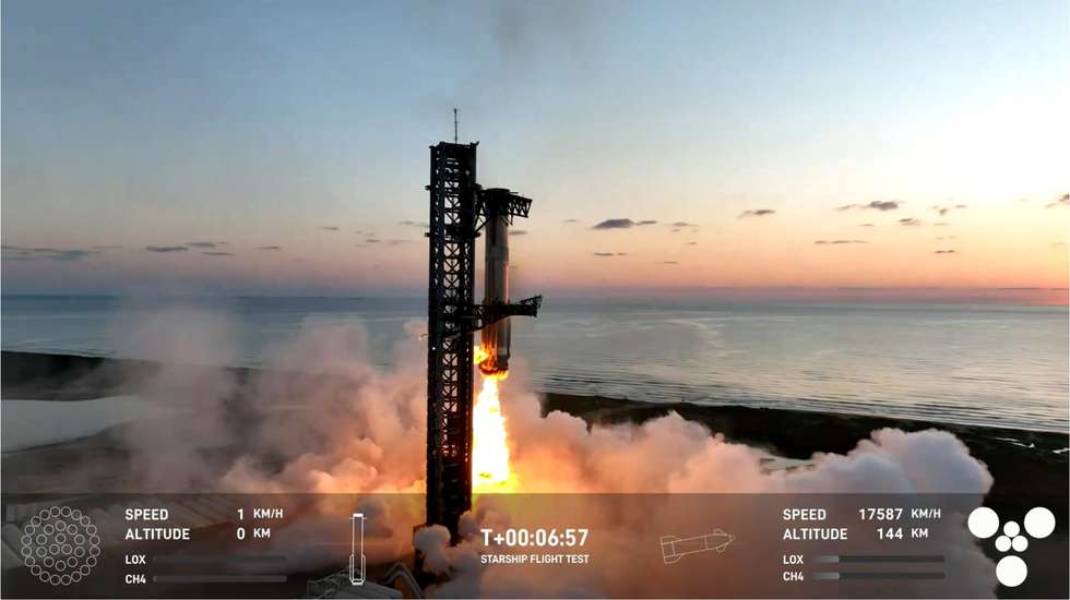 epa11657231 A still image taken from a handout video made available by SpaceX shows SpaceX’s “Mechazilla” (L) mechanical arms catching the Super Heavy rocket booster (R) mid-air as it makes a vertical landing following the launch of the unmanned Starship, at SpaceX’s Starbase facility in Boca Chica, Texas, 13 October 2024. The successful catching of the booster was the world’s first.  EPA/SPACE X HANDOUT -- MANDATORY CREDIT: SPACEX HANDOUT EDITORIAL USE ONLY/NO SALES