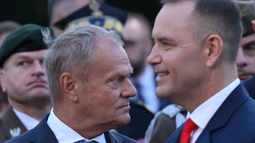 epa13203885 Polish President Karol Nawrocki (R) and Prime Minister Donald Tusk (L) attend a commemoration ceremony marking the 87th anniversary of the outbreak of World War II at the Monument to the Defenders of the Coast on Westerplatte, Gdansk, Poland, 01 September 2026. World War II began on 01 September 1939 at 4:45 a.m., when the German battleship Schleswig-Holstein opened fire on the Polish military transit depot at Westerplatte.  EPA/ADAM WARZAWA POLAND OUT
