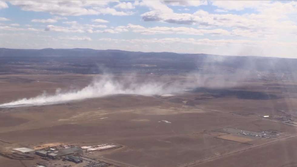 epa04707227 A still image from an undated handout video released 16 April 2015 by the Russian Emergency Ministry press service shows aerial view of smoke rising from a wildfire taken from onboard a Be-200 multipurpose  amphibious aircraft in flight over the Chita region, Transbaikal territory, southeastern Siberia, Russia. Over 6,700 people and 1,500 pieces of equipment are involved in fighting wildfires in Siberia which killed 30 people only in Khakassia.  EPA/RUSSIAN EMERGENCY MINISTRY PRESS SERVICE  HANDOUT EDITORIAL USE ONLY/NO SALES