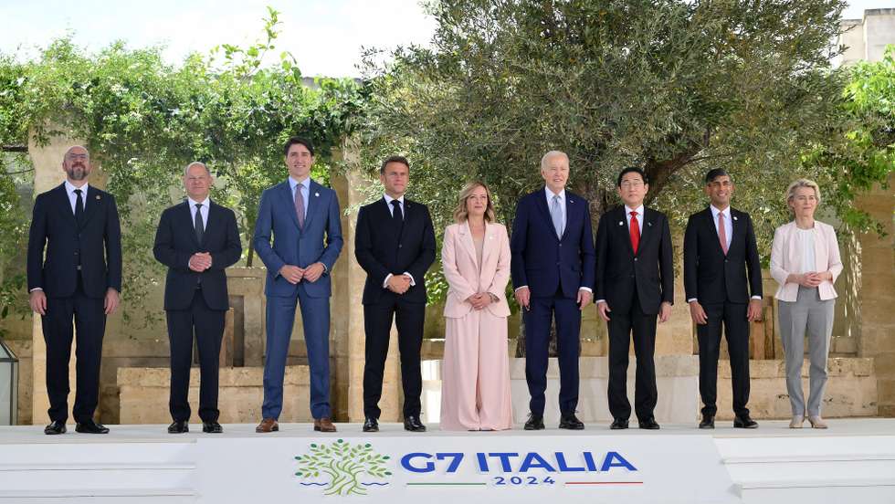 epa11407398 (L-R) European Council President Charles Michel, German Chancellor Olaf Scholz, Canadian Prime Minister Justin Trudeau, French President Emmanuel Macron, Italian Prime Minister Giorgia Meloni, US President Joe Biden, Japan's Prime Minister Fumio Kishida, British Prime Minister Rishi Sunak, European Commission President Ursula von der Leyen pose for a group photograph during a welcome ceremony for the G7 summit in Borgo Egnazia, southern Italy, 13 June 2024. The 50th G7 summit will bring together the Group of Seven member states leaders in Borgo Egnazia resort in southern Italy from 13 to 15 June 2024.  EPA/ETTORE FERRARI