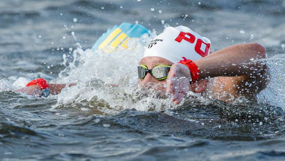 epa09393042 Angelica Andre of Portugal competes in the Women's 10km Marathon, Open Water Swimming during the Marathon Swimming events of the Tokyo 2020 Olympic Games at the Odaiba Marine Park in Tokyo, Japan, 4 August 2021.  EPA/Patrick B. Kraemer
