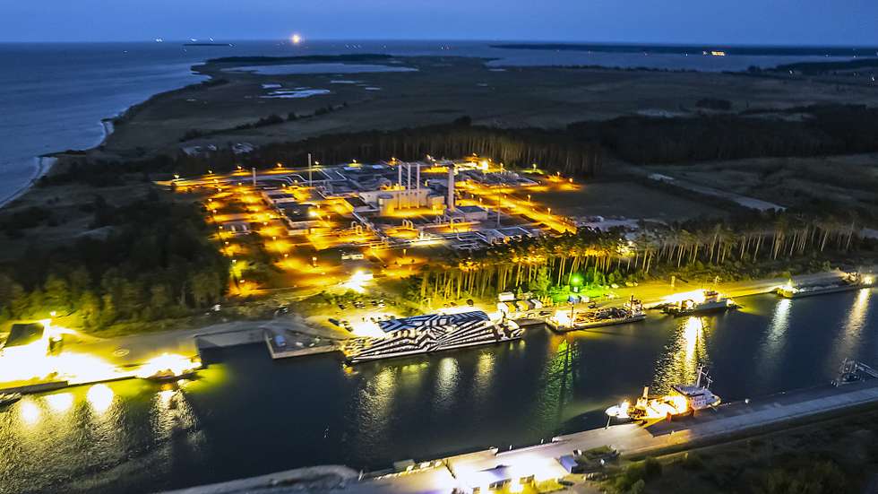 epa10168303 A picture taken with a drone shows pipes at the landfall facilities of the 'Nord Stream 1‘ gas pipeline in Lubmin, Germany, 07 September 2022. Gas supplies are being used by Russia to exert pressure on European nations in response to sanctions imposed after it invaded Ukraine. Gazprom, the Russian state-controlled gas company, closed the Nord Stream 1 pipeline from Russia to Germany. Picture taken with a slow shutter speed.  EPA/HANNIBAL HANSCHKE