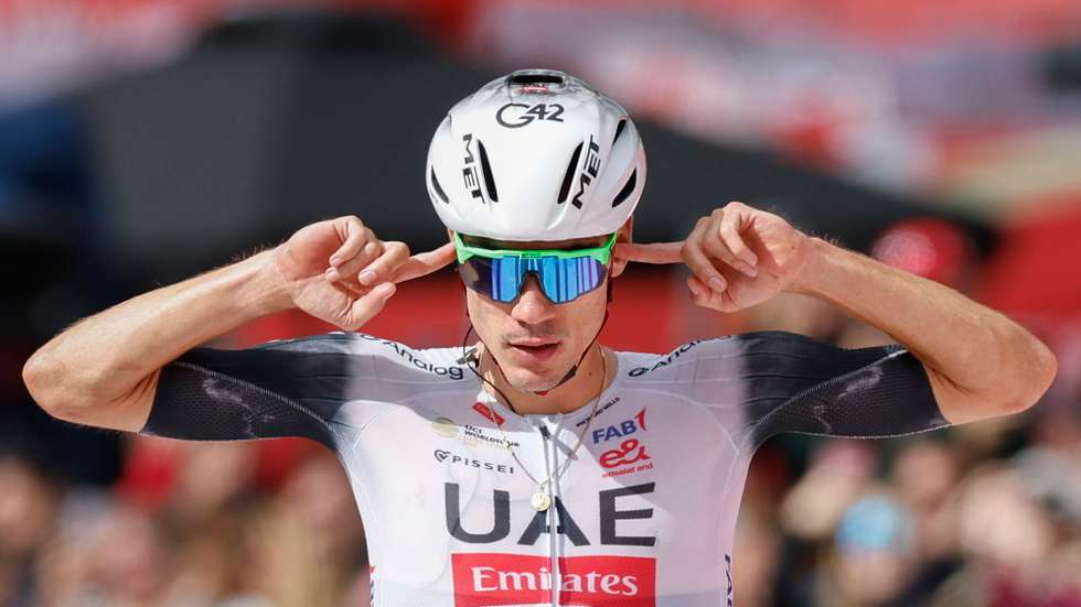epa12333942 Spanish rider Juan Ayuso of UAE Team Emirates XRG celebrates winning the seventh stage of La Vuelta a Espana cycling tour over 188km from Andorra La Vella to Cerler, Spain, 29 August 2025.  EPA/JAVIER LIZON
