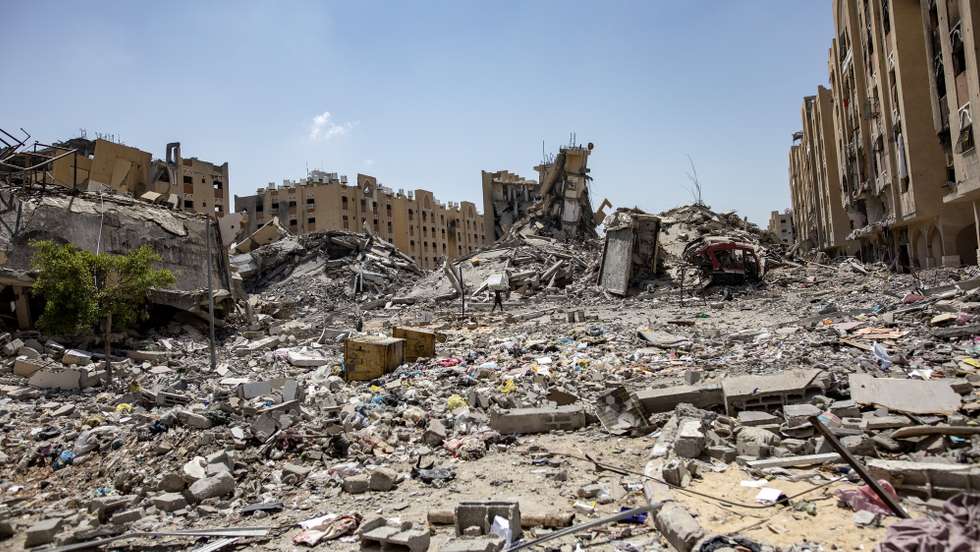 epa11562797 A view of damage after the withdrawal of Israeli forces from Hamad City in Khan Yunis, southern Gaza Strip, 24 August 2024. More than 40,000 Palestinians and over 1,400 Israelis have been killed, according to the Palestinian Health Ministry and the Israel Defense Forces (IDF), since Hamas militants launched an attack against Israel from the Gaza Strip on 07 October 2023, and the Israeli operations in Gaza and the West Bank which followed it.  EPA/HAITHAM IMAD