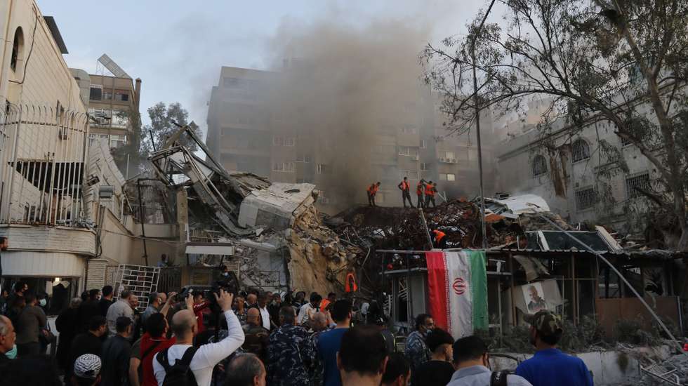 epaselect epa11254841 Destruction at the site of an airstrike next to the Iranian embassy in Damascus, Syria, 01 April 2024. According to the Syrian Arab News Agency SANA, Israel on 01 April launched an airstrike targeting the Iranian consulate building in Damascus. The embassy was damaged while the building annexed to it was destroyed. EPA/YOUSSEF DAFAWWI