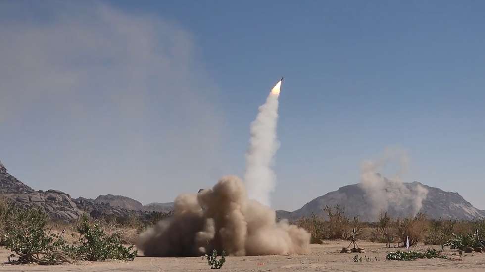 epa11074271 A handout photo made available by the Houthis Media Center on 13 January 2024 shows a projectile being launched during a military exercise near the Yemen-Saudi Arabia border at Al-Baqaa area in the northern province of Saada, Yemen, 11 January 2024. The Houthi-run al-Masirah TV has reported that new airstrikes were carried out on 13 January 2024 on a Houthi military site in Sana'a, a day after the United States and Britain carried out military strikes on several Houthis-controlled sites in Yemen in response to recent Houthis attacks on ships in the Red Sea. The US Department of Defense in December 2023 announced a multinational operation to safeguard trade and to protect ships in the Red Sea amid the recent escalation in Houthi attacks. Houthis vowed to attack Israeli-bound ships and prevent them from navigating in the Red Sea and the Bab al-Mandab Strait in retaliation for Israel's airstrikes on the Gaza Strip.  EPA/HOUTHIS MEDIA CENTER HANDOUT -- BEST QUALITY AVAILABLE -- HANDOUT EDITORIAL USE ONLY/NO SALES HANDOUT EDITORIAL USE ONLY/NO SALES