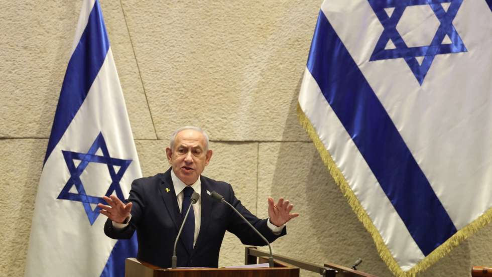 epa12516448 Israel's Prime Minister Benjamin Netanyahu speaks during a plenary session at the Knesset, the Israeli parliament in Jerusalem, 10 November 2025. The session has been initiated by the opposition demanding the establishment of a state inquiry conference to investigate the 07 October 2023 massacre.  EPA/ABIR SULTAN