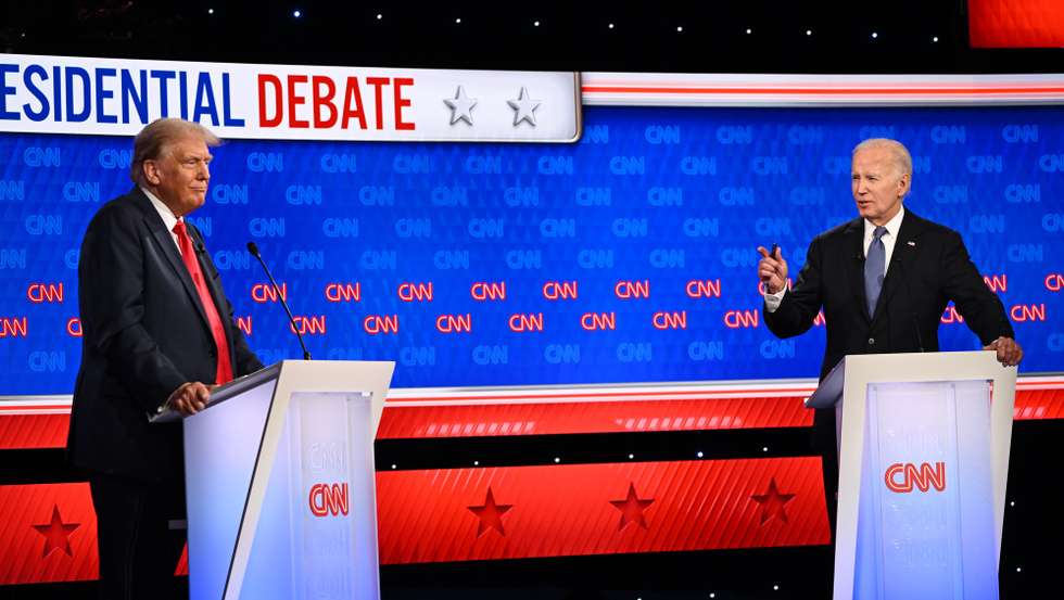 epaselect epa11442527 US President Joe Biden (R) and former US President Donald J. Trump (L) participate in the first 2024 presidential election debate, at Georgia Institute of Technology’s McCamish Pavilion in Atlanta, Georgia, USA, 27 June 2024. The first 2024 presidential election debate is hosted by CNN.  EPA/WILL LANZONI / CNN PHOTOS MANDATORY CREDIT: CNN PHOTOS / CREDIT CNN - WILL LANZONI   EDITORIAL USE ONLY  EDITORIAL USE ONLY