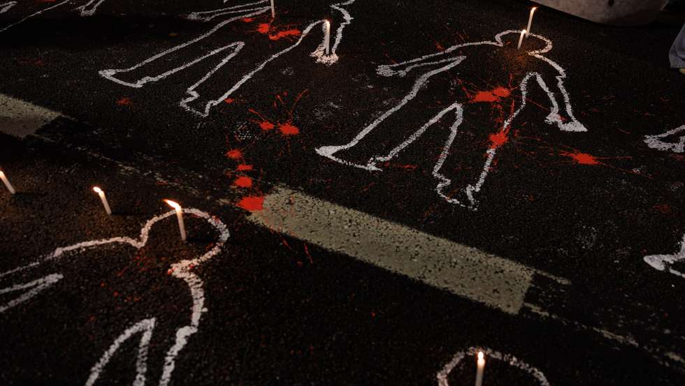epa12496550 A view of drawings of people holding candles during a demonstration against the police operation in Rio de Janeiro and in protest against Governor Cláudio Castro in São Paulo, Brazil, 31 October 2025. The demonstration followed a police raid in Rio de Janeiro that left more than 60 people dead, sparking nationwide outrage and calls for Governor Castro’s resignation.  EPA/Isaac Fontana