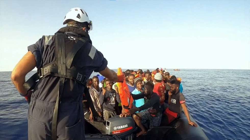 epa08639759 A handout grab photo made available from a video provided by the NGO 'Sea-Watch 4' shows rescued migrants and heading to Palermo, Italy, 01 September 2020. According to reports, the charity vessel rescued 353 people and will be disembarked in Palermo after a ship quarantine.  EPA/Ufficio Stampa Sea Watch HANDOUT  HANDOUT EDITORIAL USE ONLY/NO SALES