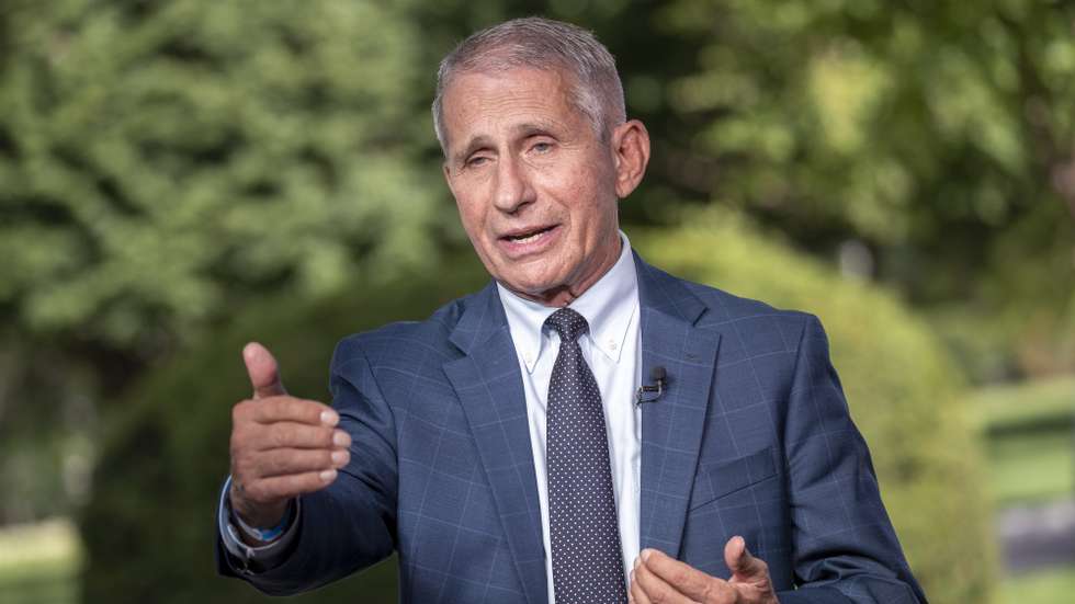 epa09419588 Anthony Fauci, director of the US National Institute of Allergy and Infectious Diseases (NIAID) participates in a television interview at the White House in Washington, DC, USA, 18 August 2021. President Biden said top federal health officials recommend that all Americans get a booster shot eight months after becoming fully vaccinated against COVID-19.  EPA/SHAWN THEW