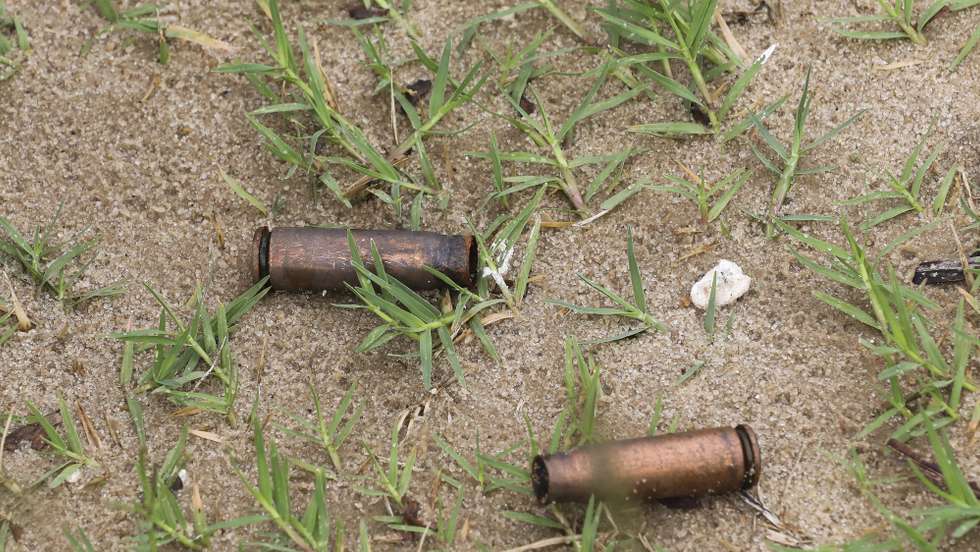 epa09131133 Spent AK rifle capsules in the street of Palma, Cabo Delgado, Mozambique, 12 April 2021. The violence unleashed more than three years ago in Cabo Delgado province escalated again about two weeks ago, when armed groups first attacked the town of Palma.  EPA/JOAO RELVAS