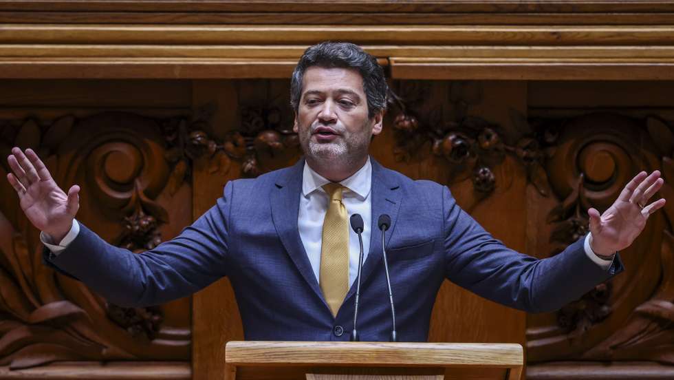O líder do Chega, André Ventura, intervém durante o debate parlamentar na Assembleia da República em Lisboa, 14 de maio de 2026. TIAGO PETINGA/LUSA