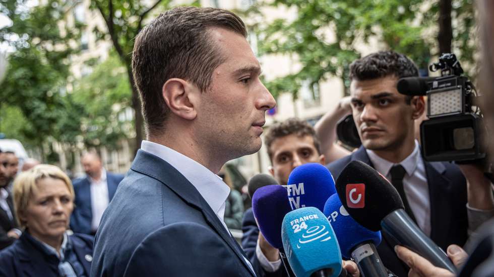 epa11466722 President of the National Rally (Rassemblement National, RN), Jordan Bardella speaks to media as he arrives at the far-right party headquarter, one day after their defeat in the second round of the parliamentary elections, in Paris, France, 08 July 2024. France voted in the second round of the legislative elections on 07 July. According to the first official results, the left-wing New Popular Front (Nouveau Front populaire, NFP) was ahead of President Macron's party and Le Pen's far-right National Rally (RN).  EPA/CHRISTOPHE PETIT TESSON