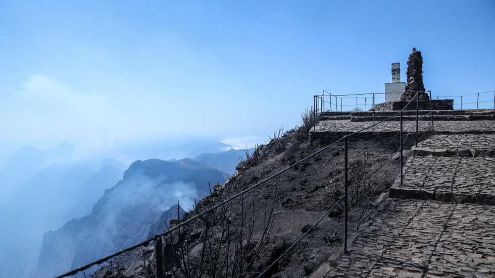 Geodesic landmark on Pico Ruivo, the highest point on Madeira Island, from where you can see the clouds of smoke from the fire that has been raging on Madeira Island, municipality of Santana, 21 August 2024. The rural fire on the island of Madeira broke out a week ago, on 14 August, in the mountains of the municipality of Ribeira Brava, gradually spreading to the municipalities of Câmara de Lobos, Ponta do Sol and, through Pico Ruivo, Santana. HOMEM DE GOUVEIA/LUSA