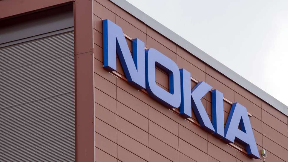 epa09078027 (FILE) - A Nokia logo on the wall of Nokia company headquarters in Espoo, Finland 16 April 2015 (reissued 16 March 2021). Nokia is to cut up to 10,000 jobs in the coming 2 years, the company announced.  EPA/MARKKU OJALA *** Local Caption *** 56668153