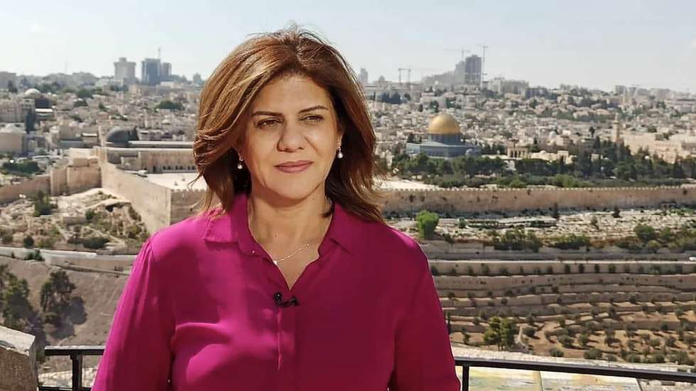 epa09939255 An undated handout photo made available by Al Jazeera network on 11 May 2022 showing Al Jazeera journalist Shireen Abu Akleh standing with the Old City of Jerusalem in the background. According to the Palestinian health ministry, Al Jazeera journalist Shireen Abu Akleh was shot and killed on 11 May 2022 by Israeli forces during an Israeli raid in the West Bank town of Jenin.  EPA/AL JAZEERA HANDOUT  HANDOUT EDITORIAL USE ONLY/NO SALES