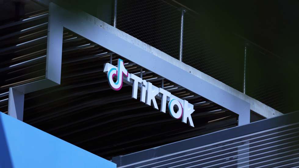 epa11298580 A sign is on display at TikTok in Los Angeles, California, USA, 24 April 2024. US President Biden signed on 24 April a law that would ban Chinese-owned TikTok unless it is sold within a year.  EPA/ALLISON DINNER