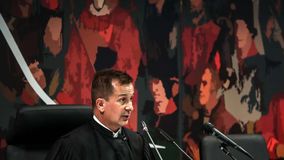 The juge Ivo Rosa reads the instructional decision of the high-profile corruption case known as Operation Marques, at the Justice Campus in Lisbon, Portugal, 09 April 2021. Operation Marques has 28 defendants - 19 people and 9 companies - including former Prime Minister Jose Socrates, banker Ricardo Salgado, businessman and friend of Socrates Carlos Santos Silva, and senior executives of Portugal Telecom, and is related to crimes of active and passive corruption, money laundering, document forgery, and tax fraud.  MARIO CRUZ/POOL/LUSA