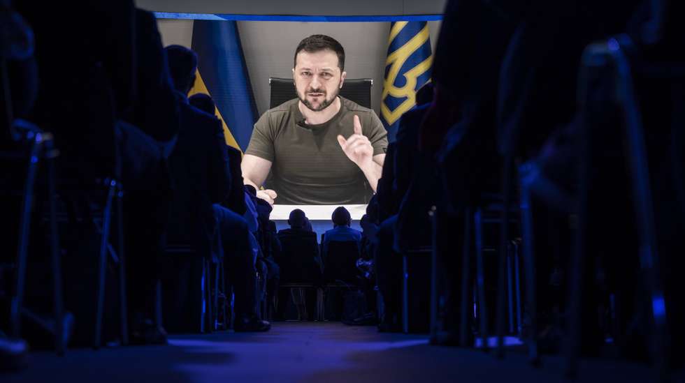 epa09968490 Ukrainian President Volodymyr Zelensky delivers an address via videolink during the opening plenary session of the 51st annual meeting of the World Economic Forum (WEF) in Davos, Switzerland, 23 May 2022. The forum has been postponed due to the COVID-19 pandemic and was rescheduled to early summer. The meeting brings together entrepreneurs, scientists, corporate and political leaders in Davos under the topic 'History at a Turning Point: Government Policies and Business Strategies' from 22 to 26 May 2022.  EPA/LAURENT GILLIERON