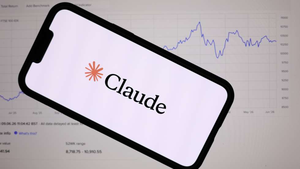 epa13026235 The Anthropic Claude logo is displayed on a mobile phone over a stock market graph displayed on a laptop screen in Liverpool, Britain, 09 June 2026. Leading AI (artificial intelligence) and technology companies Anthropic, OpenAI, and SpaceX are preparing to go public this year at an estimated combined valuation of around four trillion dollars (approximately 3.44 trillion euros).  EPA/ADAM VAUGHAN
