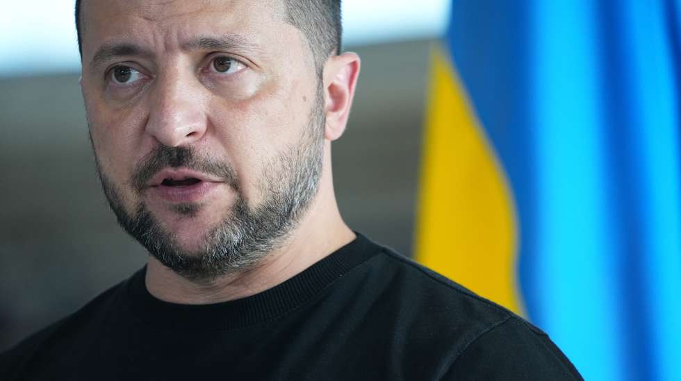 epa10810316 Ukrainian President Volodymyr Zelensky speaks at a press conference during a meeting with Denmark's Prime Minister Mette Frederiksen at Skrydstrup Airbase in Vojens, Denmark, 20 August 2023. The US State Department recently permitted Denmark to hand over F-16 fighter jets to Ukraine, a program to train Ukraine's pilots to the F-16s is already underway in Denmark.  EPA/MADS CLAUS RASMUSSEN