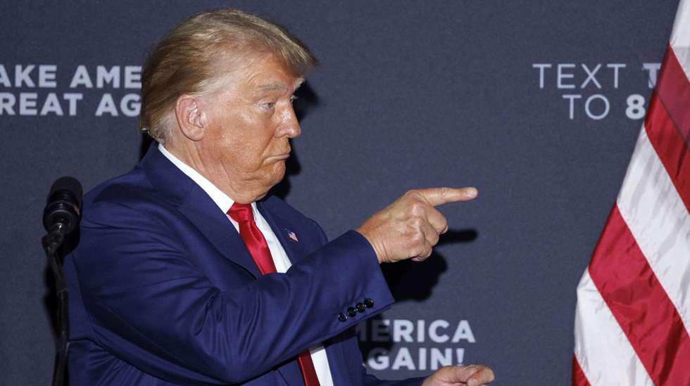 epa10791192 Republican candidate for President Former US President Donald Trump addresses a crowd of supporters during a rally at Windham High School in Windham, New Hampshire, USA, 08 August 2023.  EPA/CJ GUNTHER