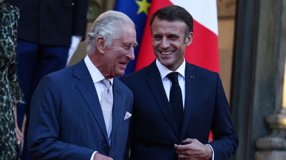 epa10875544 Britain's King Charles III (L) departs after meeting with French President Emmanuel Macron (R) at the Elysee Palace in Paris, France, 21 September 2023, during a state visit to the country. The British royal couple's three-day state visit was initially planned for March 2023 but postponed due to widespread demonstrations in France against the government's pension reforms.  EPA/Mohammed Badra