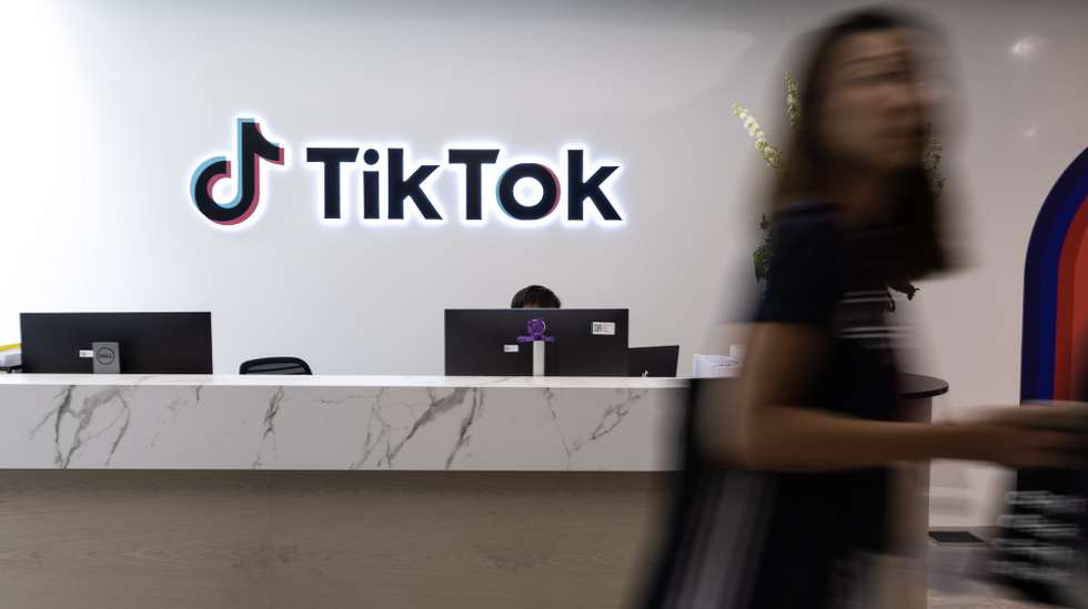 epa10826357 A staff member walks past the reception counter in the TikTok office during a press tour of Bytedance and TikTok’s offices in Singapore, 29 August 2023. ByteDance Ltd. is the parent company of popular short-video platform TikTok, which has headquarters in Singapore and Los Angeles.  EPA/HOW HWEE YOUNG