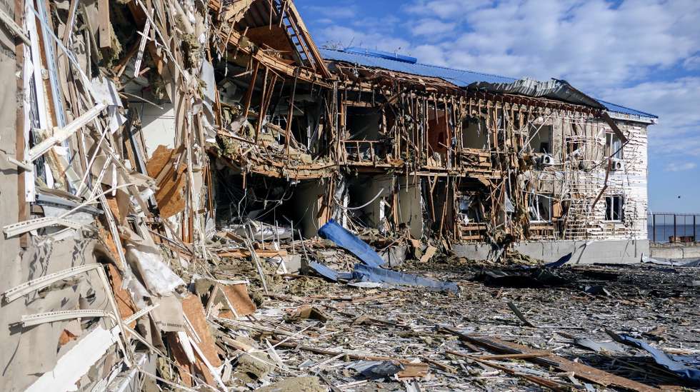 epa10923266 The building of a sailing school, damaged by debris of a downed drone in Odesa, Ukraine, 17 October 2023. Six Shahed attack drones were downed according to the Odesa Obast Military Administration, damaging the sailing school, a hangar and several civilian boats.  EPA/Ihor Tkachenko
