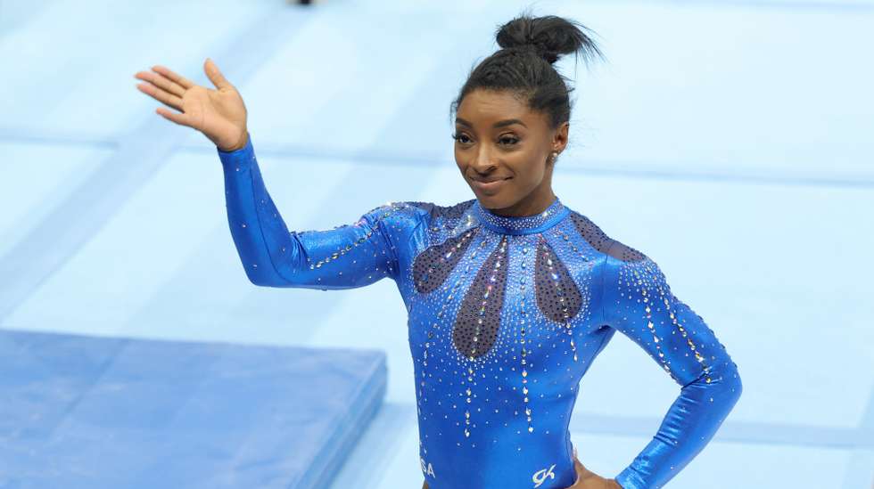 epa10904369 Simone Biles of the United States of America reacts prior to win the Gold Medal of the Women's All-Around Final of the Artistic Gymnastics World Championships in Antwerp, Belgium, 06 October 2023.  EPA/OLIVIER MATTHYS