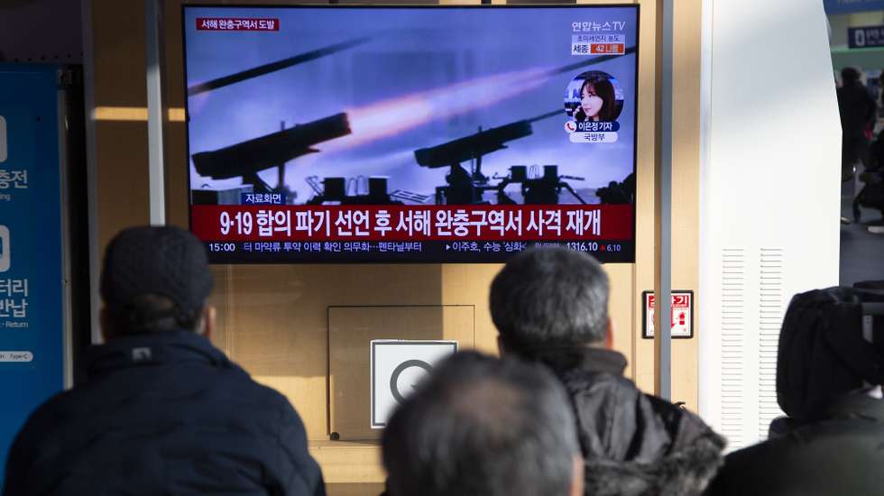 epa11058058 People watch the news on a TV at a station in Seoul, South Korea, 05 January 2024. According to South Korea's Joint Chiefs of Staff (JCS), North Korea fired some 200 artillery shells into waters off its western coast on 05 January morning, towards the South's Yeonpyeong island. Civilians on the islands of Yeonpyeong and Baengnyeong have been ordered to evacuate into shelters, South Korean officials said.  EPA/JEON HEON-KYUN