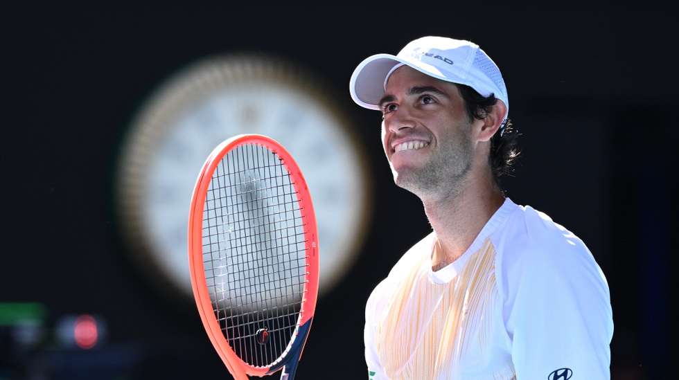 epa11095377 Nuno Borges of Portugal celebrates winning the 3rd set during his 4th round match against Daniil Medvedev of Russia on Day 9 of the 2024 Australian Open at Melbourne Park in Melbourne, Australia, 22 January 2024.  EPA/JOEL CARRETT  AUSTRALIA AND NEW ZEALAND OUT