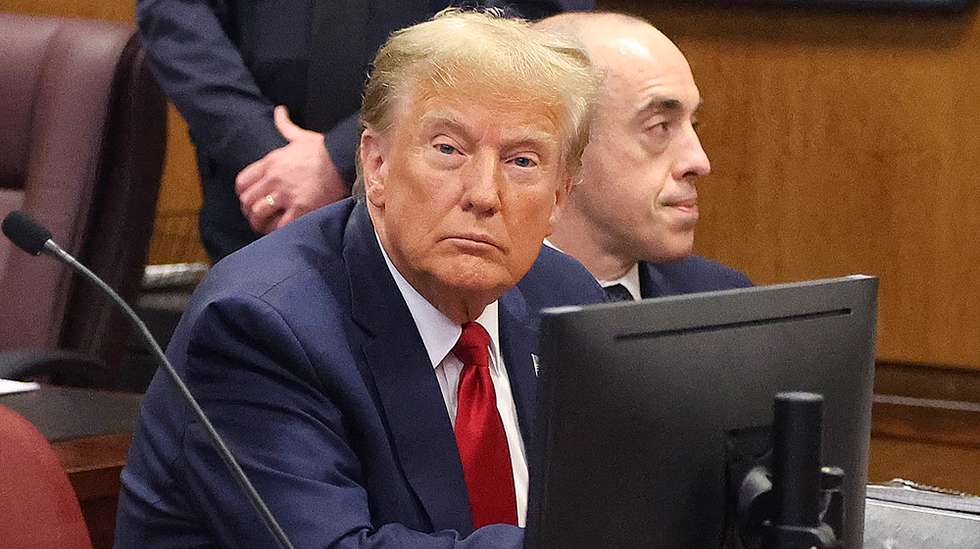 epa11155190 Former U.S. President Donald Trump (L) awaits the start of a hearing at the New York City Criminal Court in New York City, USA, 15 February 2024. Trump is facing 34 felony counts of falsifying business records related to payments made to adult film star Stormy Daniels during his 2016 presidential campaign. A New York judge says former President Donald Trump's hush-money trial will go ahead as scheduled with jury selection starting on March 25.  EPA/JEFFERSON SIEGEL / POOL