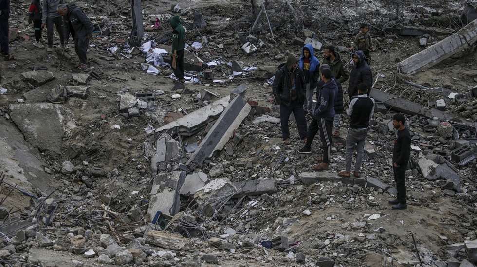 epa11229019 Palestinians search for missing people under the rubble of the destroyed house of the Al Hajj family following an Israeli air strike, in Al Nusairat refugee camp, southern Gaza Strip, 19 March 2024. According to the Palestinian Ministry of Health, more than 10 members of the same family were killed and six remain trapped under the rubble following an overnight Israeli air strike. More than 31,500 Palestinians and over 1,300 Israelis have been killed, according to the Palestinian Health Ministry and the Israel Defense Forces (IDF), since Hamas militants launched an attack against Israel from the Gaza Strip on 07 October 2023, and the Israeli operations in Gaza and the West Bank which followed it.  EPA/MOHAMMED SABER
