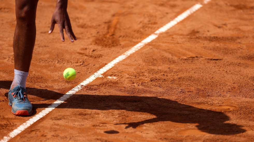 epa10558160 Henrique Rocha of Portugal serves against Bernabe Zapata Miralles of Spain in the Round of 32 at the Estoril Open tennis tournament in Estoril, Portugal, 04 April 2023. Zapata Miralles won in two sets.  EPA/MIGUEL A. LOPES