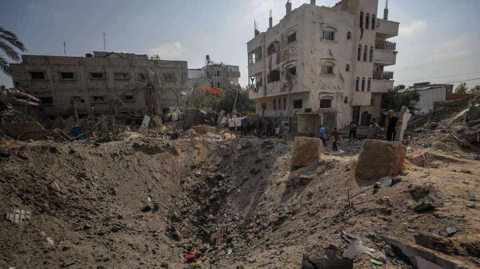 epaselect epa11386861 Palestinians inspect the damage following an Israeli air strike in Al Nuseirat refugee camp, central Gaza Strip, 03 June 2024. More than 25 people were killed following overnight Israeli military strikes in Al Nuseritat and Al Bureij camps, according to the Palestinian Ministry of Health. More than 36,000 Palestinians and over 1,400 Israelis have been killed, according to the Palestinian Health Ministry and the Israel Defense Forces (IDF), since Hamas militants launched an attack against Israel from the Gaza Strip on 07 October 2023, and the Israeli operations in Gaza and the West Bank which followed it.  EPA/MOHAMMED SABER