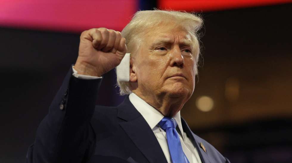 epaselect epa11482890 Republican presidential nominee Donald Trump gestures on the second day of the Republican National Convention (RNC) in Milwaukee, Wisconsin, USA, 16 July 2024. The convention comes days after a 20-year-old Pennsylvania man attempted to assassinate former president and current Republican presidential nominee Donald Trump. The 2024 Republican National Convention is being held from 15 to 18 July 2024, in which delegates of the United States Republican Party select the party's nominees for president and vice president in the 2024 United States presidential election.  EPA/ALLISON DINNER