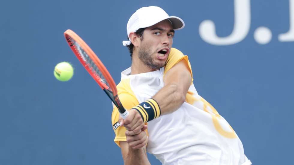 epa11572022 Nuno Borges of Portugal hits a return to Thanasi Kokkinakis of Australia during their second round match at the US Open Tennis Championships at the USTA Billie Jean King National Tennis Center in Flushing Meadows, New York, USA, 29 August 2024. The US Open tournament runs from 26 August through 08 September.  EPA/JUSTIN LANE