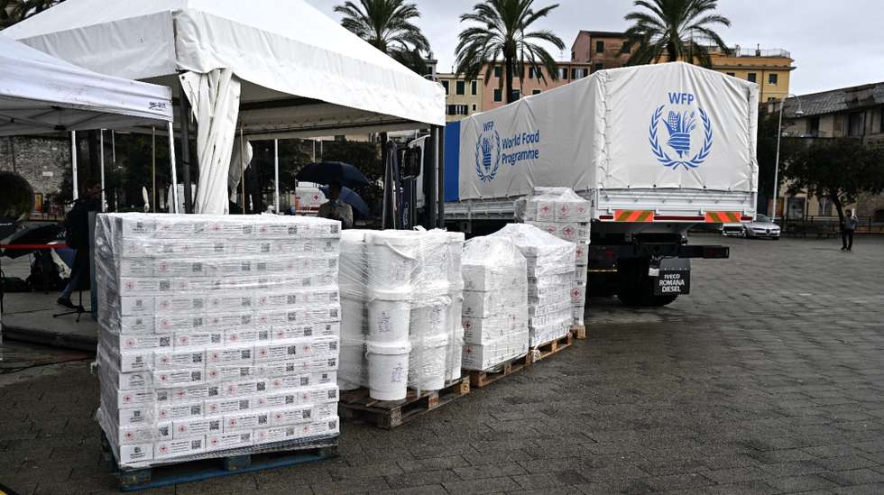 epa11682849 The first of 15 trucks donated by Italy to the World Food Programme (WFP) as part of the 'Food for Gaza' initiative, during its handover ceremony at the port of Genoa, Italy, 25 October 2024. The trucks will ensure the distribution of humanitarian aid inside the Gaza Strip.  EPA/LUCA ZENNARO