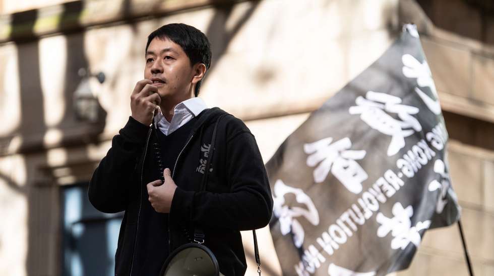 epa09263825 Former Hong Kong Politician Ted Hui speaks at a rally to show concern for the increasing Chinese influence in Australia and to show support to Hongkongers, in Sydney, Australia, 12 June 2021.  EPA/JAMES GOURLEY AUSTRALIA AND NEW ZEALAND OUT