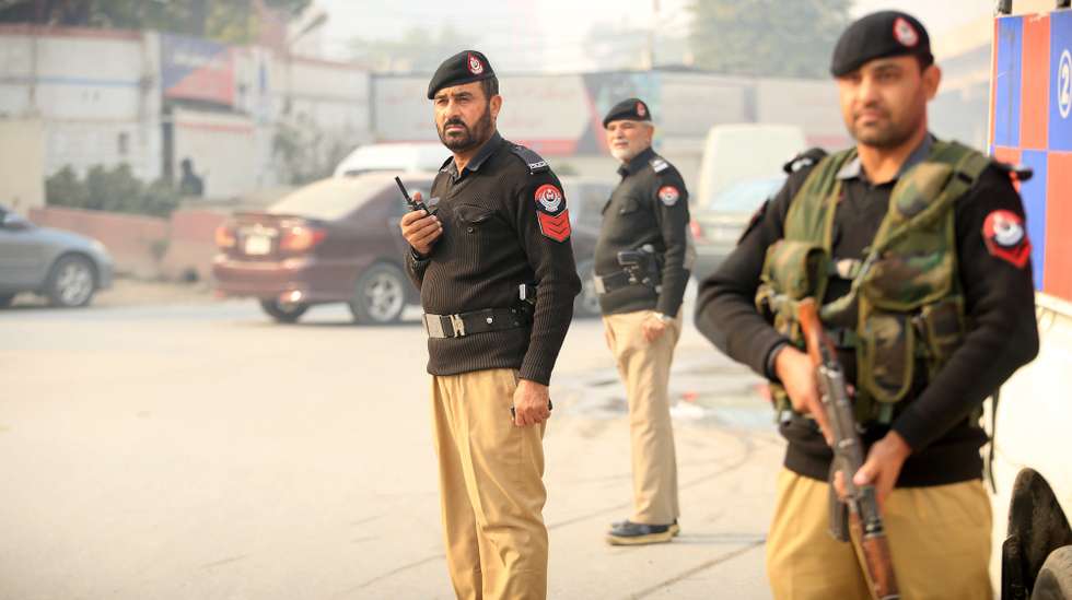 epa11791799 Pakistani security officials stand guard at a checkpoint on the eve of Christmas in Peshawar, Pakistan, 24 December 2024. Billions of people around the world celebrate Christmas each year on 25 December to honor the birth of Jesus Christ.  EPA/BILAWAL ARBAB