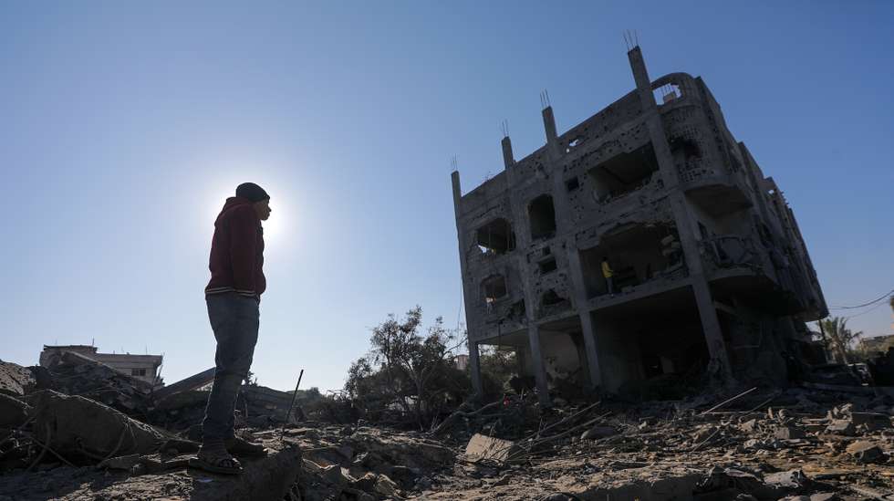 epa11803383 Palestinians inspect the destroyed house of the Abu Libda family following an Israeli air strike in Al Maghazi refugee camp, central Gaza Strip, 03 January 2025. According to reports from the Ministry of Health in Gaza at least nine members of the Abu Libda family were killed following an Israeli air strike in the refugee camp. More than 45,500 Palestinians and over 1,400 Israelis have been killed, according to the Palestinian Health Ministry and the Israeli Army, since Hamas militants launched an attack against Israel from the Gaza Strip on 07 October 2023 and the Israeli operations in Gaza and the West Bank that followed it.  EPA/MOHAMMED SABER