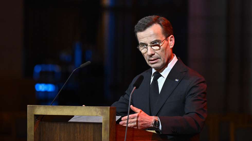 epa11793997 Swedish Prime Minister Ulf Kristersson delivers a speech during a memorial service for the victims of the 2004 tsunami in the Indian Ocean, in Uppsala, Sweden, 26 December 2024. The 2004 Indian Ocean tsunami, which struck on 26 December 2004 triggered by a 9.2 magnitude earthquake in the Indian Ocean off the west coast of northern Sumatra, Indonesia, claimed over 220,000 lives, internally displaced more than half a million people, and left hundreds of thousands without livelihoods, according to the United Nations, making it one of the deadliest natural disasters in history.  EPA/CHRISTINE OLSSON  SWEDEN OUT