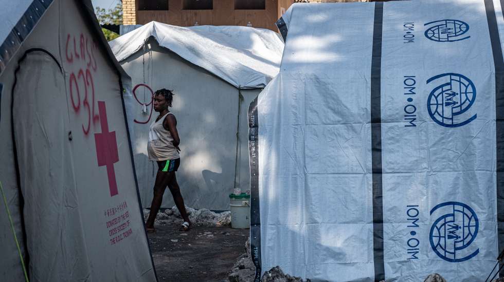 epa11820717 A person walks inside the ruins of the Rex Theater, destroyed in the 2010 earthquake in Port-au-Prince, Haiti, 11 January 2025 (issued 12 January 2025). Haiti continues to suffer the effects of the 2010 earthquake, which killed more than 250,000 people and left 1.3 million Haitians homeless.Â   EPA/JOHNSON SABIN