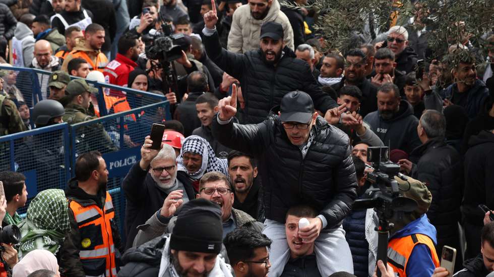 epa11882490 A released Palestinian prisoner is welcomed upon arrival to Ramallah in the West Bank, 08 February 2025. Israel has returned Palestinian prisoners following the release of three Israeli hostages, Eli Sharabi, Ohad Ben Ami and Or Levy, as part of the ongoing Israeli-Hamas hostage release and ceasefire deal.  EPA/ALAA BADARNEH