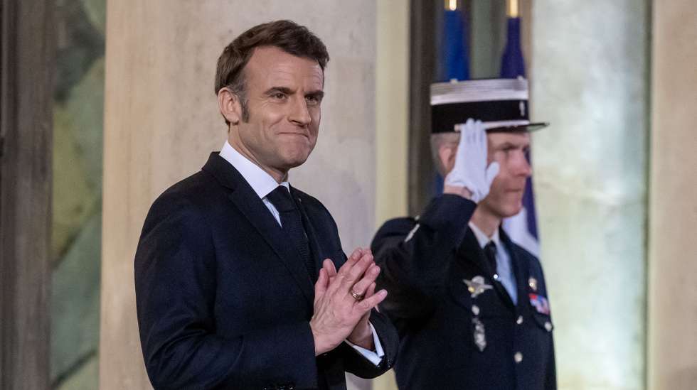 epa11942944 French President Emmanuel Macron gestures as he attends to welcome Hungary's Prime Minister Viktor Orban for a working dinner at Elysee Palace in Paris, France, 05 March 2025.  EPA/CHRISTOPHE PETIT TESSON